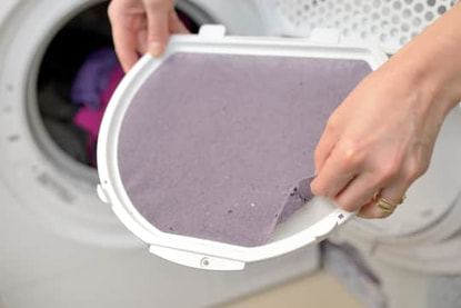 cleaning the lint filter of your commercial dryer